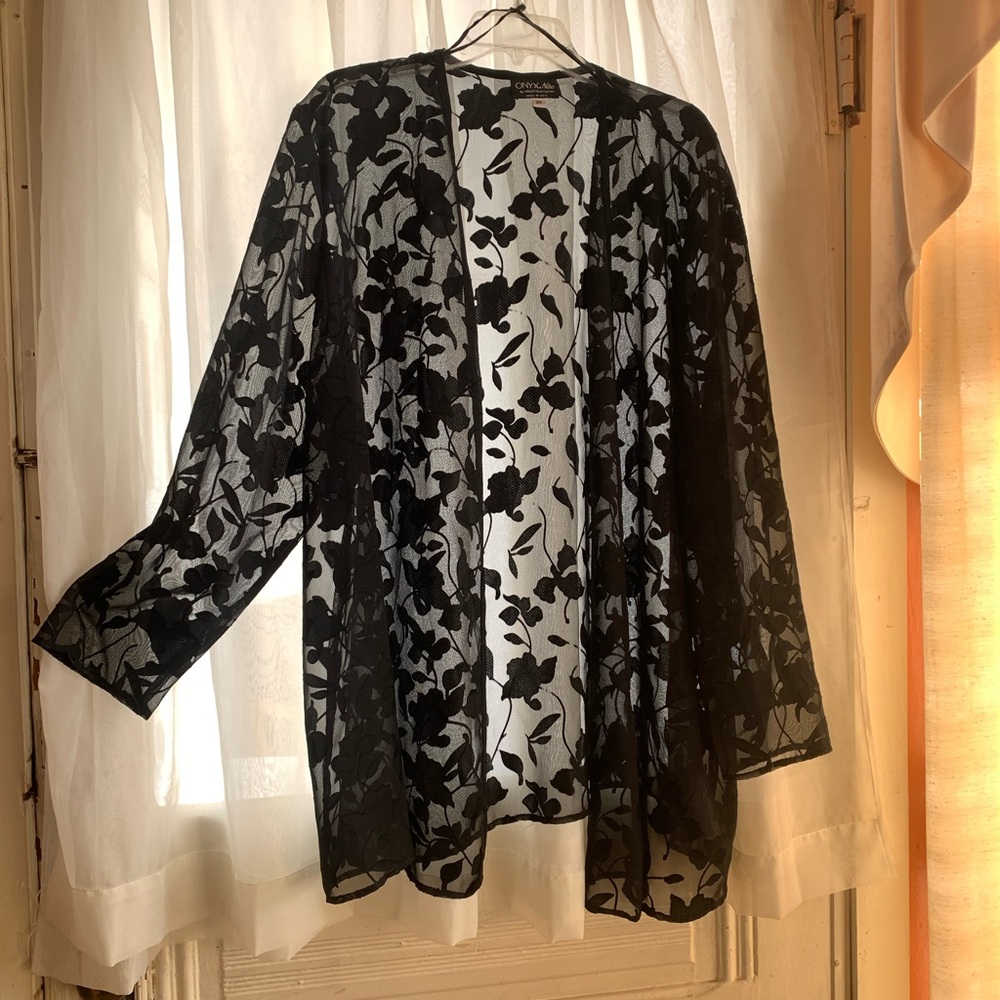 Black Floral. You can dress it up or wear it with jeans and boots
